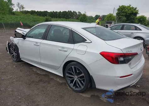 2022 Honda Civic Touring z USA, uszkodzony, nr VIN 2HGFE1F91NH301632